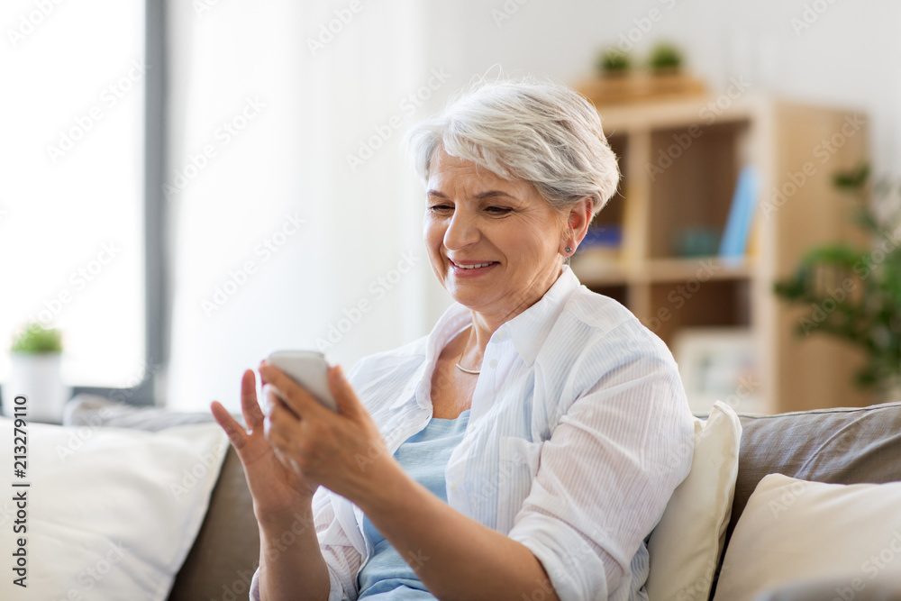 Canvas Prints technology, communication and people concept - happy senior woman with smartphone at home