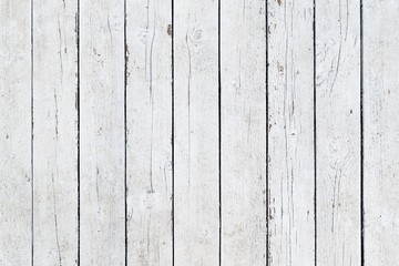 White texture of wooden boards with black slits