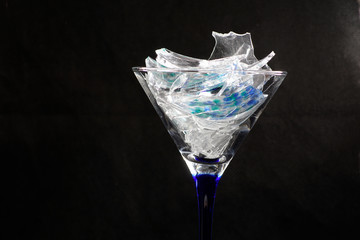 Shot in studio on glass against black background with flash light
