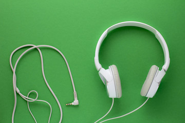 Headphone on green background