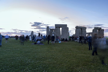 People enjoying summer Solstice at Stonehenge England.