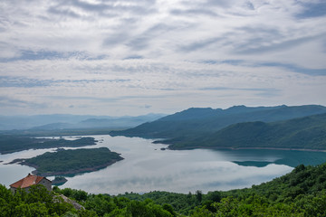 A picturesque lake with clear water in the mountains.