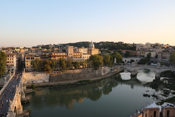 Fototapeta na wymiar Dusk at Angel bridge and Ponte Vittorio Emanuele II in Rome, Italy 