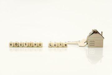 concept of 'housing loan' key and keychain house