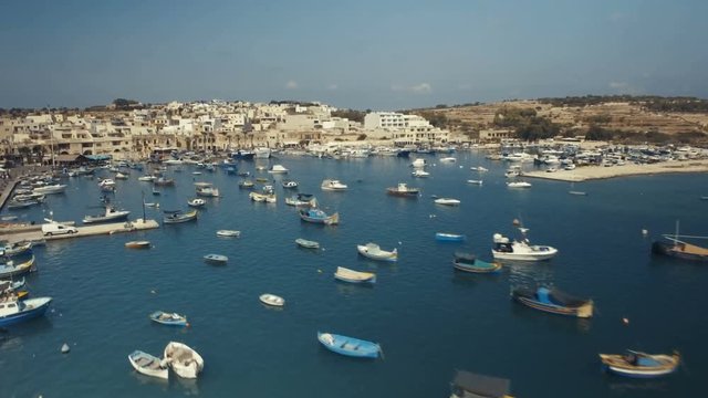 Aerial shot over moored fishing boats in Marsaxlokk