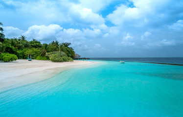 Luxury beach on the paradise island in the Indian ocean. Vacation deluxe. Summer travel.  Maldives