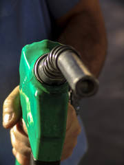 Sao Paulo, Brazil, August 15, 2007. Gas nozzle in man's hand