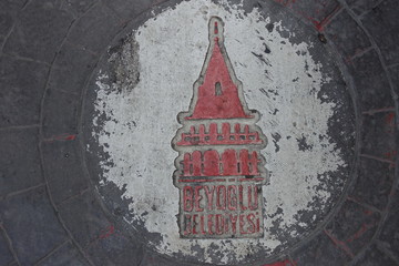 Beyoğlu Belediyesi district of Istanbul symbol carved on the cubic stones street