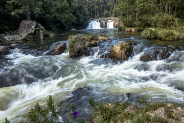 Fototapeta na wymiar Waterfall in Parelheiros neighborhood, south of the Sao Paulo city