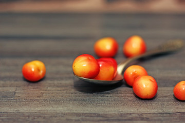 scattered cherries on the table