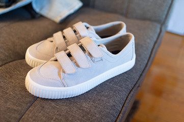 Grey shoe with strap design