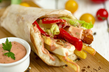 Wrap with ingredients on a board.