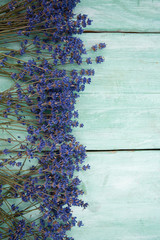 lavender flowers on wooden surface