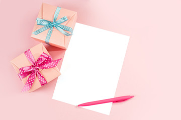 Decorated boxes and blank white sheet of paper.