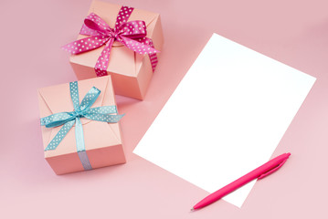 Decorated boxes and blank white sheet of paper.