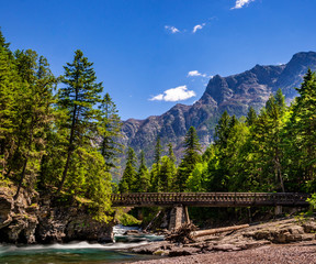 This horse bridge is part of the Johns Lake Loop Trail and spans McDonald Creek in Glacier National...