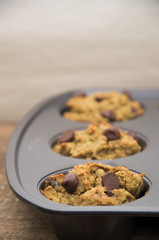 A pan of a dozen chocolate chip muffins