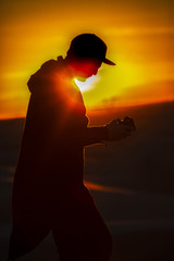 Man looks at back of camera