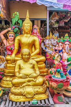 Religious artifacts on sale by the road in Lang Suan, Thailand