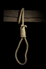 Rope from a rope on a wooden crossbeam