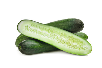 whole and half cucumber isolated on white background