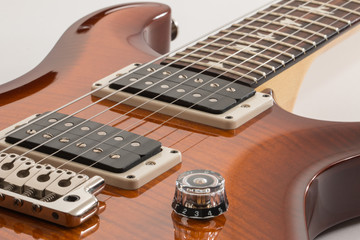 Fototapeta na wymiar Electric guitar close up of pickups and bridge.