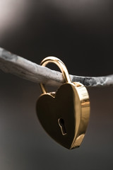 Golden Heart Lock on a railing