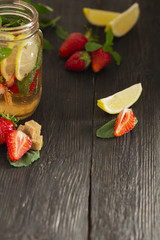 cocktail with fresh fruits, berries and mint