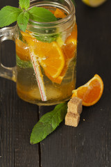 Refreshing summer cocktail with chopped ice and citrus fruits
