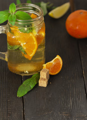 Refreshing summer cocktail with chopped ice and citrus fruits