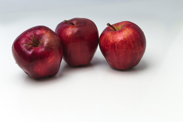Red apple with white copy space