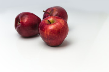 Red apple with white copy space