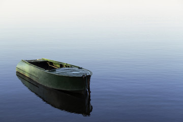 fisherman's boat on the lake