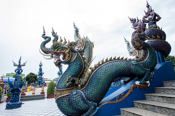 Fototapeta na wymiar The beautiful Thai animal sculpture from the faith in Buddhism at Wat Rong Sue Ten, Chiang Rai, Thailand