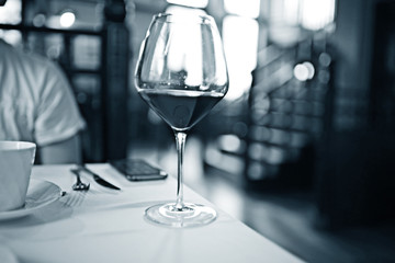 glass red wine on the table restaurant