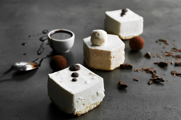 Tasty souffle cakes on dark background