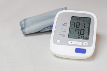 Autonamic blood pressure  showing a normal blood pressure on white background.spot focus.