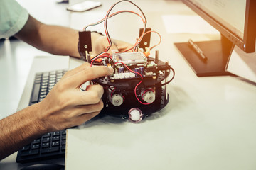 Teacher learning preparing take note in STEM Education robotics for creating project based studying for innovation robot model for student in computer teachnology classroom, back to school