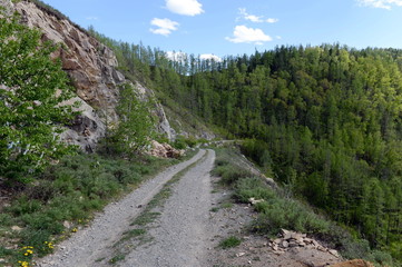 Fototapeta na wymiar Pass Chike-Taman. The old road of the Chuysk tract. Mountain Altai. Western Siberia