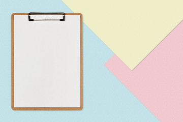 Clipboard with white sheet on pastel color background, Minimal concept
