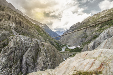 TRIFT HANGING BRIDGE. SWISS ALPS  NATURE. MOUNTAIN LANDCSAPE