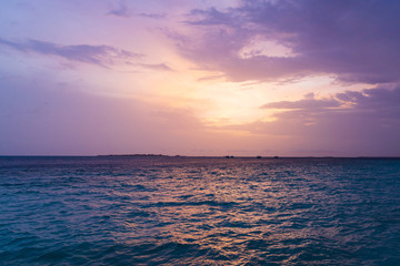 Fototapeta na wymiar Beautiful tropical Maldives island in the ocean background.