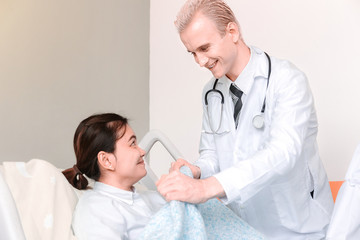 Medical at the hospital checking paperwork and patient's medical records, healthcare and teamwork concept.