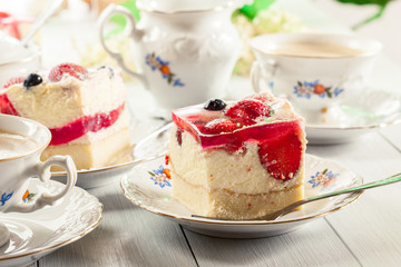 Cheesecake with strawberries, blueberry and jelly