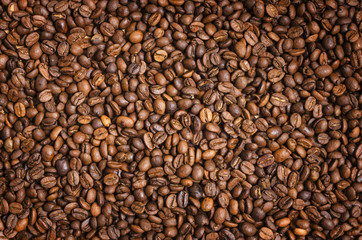 Coffee background. Brown roasted coffee beans.