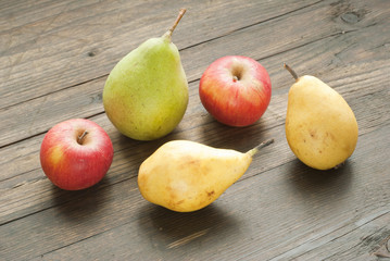 pears , apples on wooden table