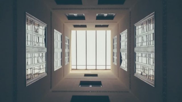 A hallway filled with windows.