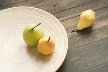 pears on wooden table