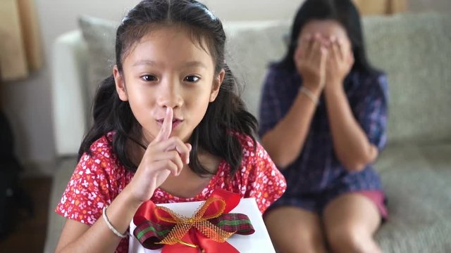 Daughter give mom the surprise gift ,Concept of Mother day in slow motion footage