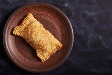 Brazilian food pastel. Homemade. Copyspace.
